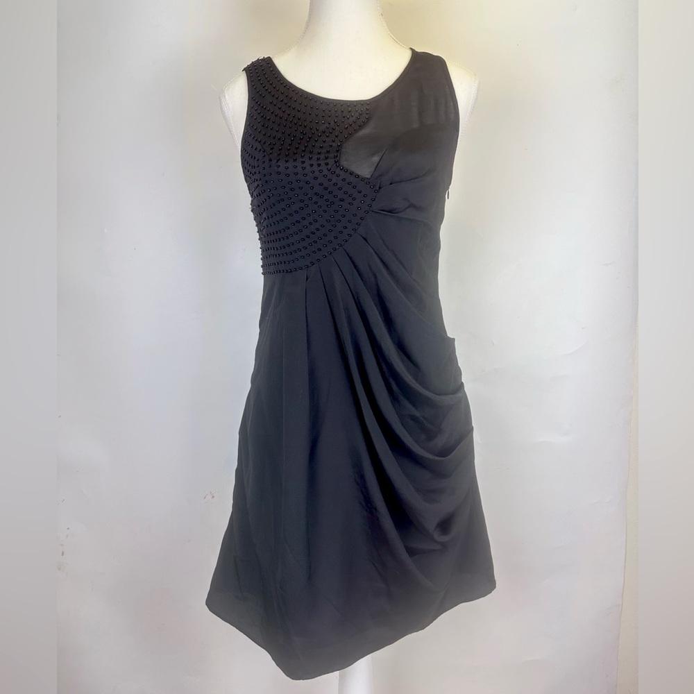 Esley Collection Black Cocktail Dress. Unique design, beaded